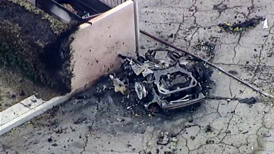 Debris is spilled onto the street after what the Mayor described as a bomb exploded in Palm Springs