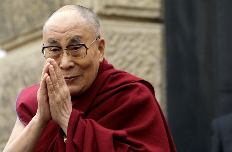 Tibet's exiled spiritual leader the Dalai Lama gestures during his visit in Prague